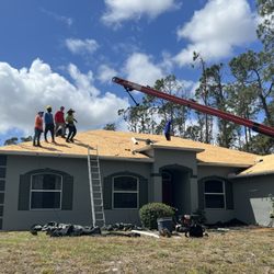 S F Roofing Quest - Tearing off old roof and getting delivery