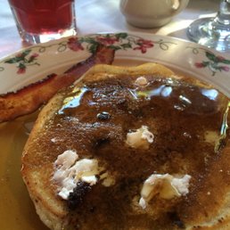 Fresh blueberry pancakes with real maple syrup. Fresh blueberry pancakes with real maple syrup.