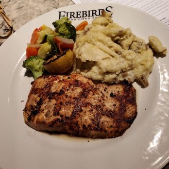 Firebirds Wood Fired Grill - Wood Grilled Salmon - Steakhouses Near Me - Dania Beach, Florida Firebirds Wood Fired Grill - Wood Grilled Salmon - Steakhouses Near Me - Dania Beach, Florida