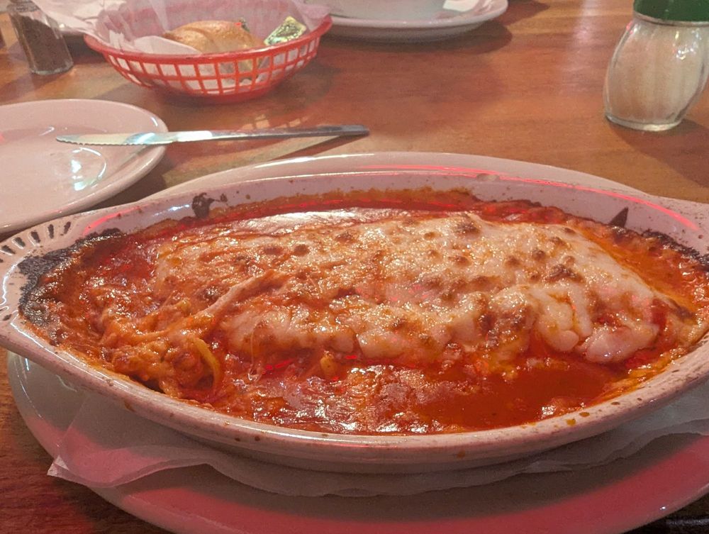 Prima Pasta Italian Restaurant and Pizza Logo