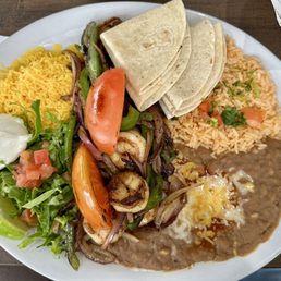 Shrimp Fajitas with pinto beans.