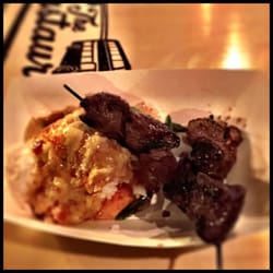 The Bustaurant - Steak kabobs and sweet and savory sticky rice