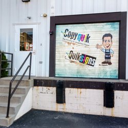 Copyquik Printing & Graphics - Our spectacular dock door wrap. Premium Vinyl can make your doors come to life!