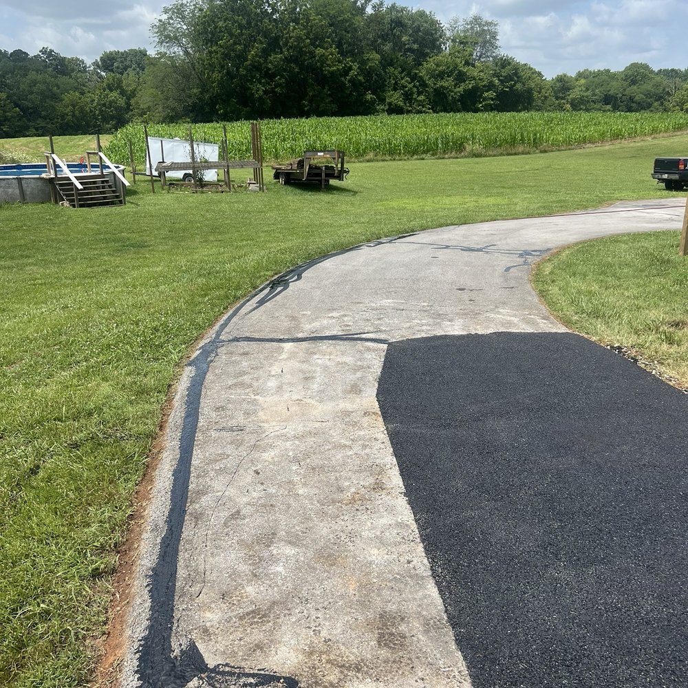 King Armor Asphalt Sealing - New area repaired - Masonry/Concrete Near Me King Armor Asphalt Sealing - New area repaired - Masonry/Concrete Near Me