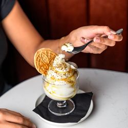 ORA FreeStyle Italian - Soft Serve Gelato copette fiore de latte: fennel pollen, honey, sea salt, evo, pizelle cookie add a shot of pistachio cream liqueur.