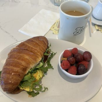 Lola's Cafe and Kitchen - Cali scrambled egg croissant with fruit and there house coffee . - Cafes Near Me - Absecon, New Jersey