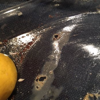 Kanella - Burnt takeout container from hot sardine being placed directly on the plastic. Health hazard! - Mediterranean Near Me - Philadelphia, Pennsylvania