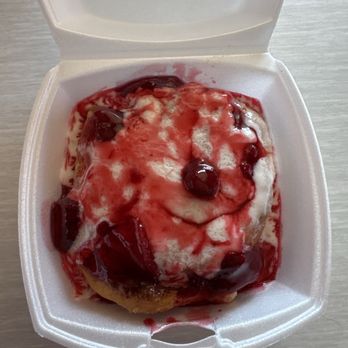 Mountain View Diner - Homemade cinnamon roll with lemon icing and strawberry topping - Seafood Near Me - Fort Garland, Colorado