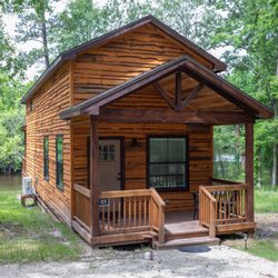 Two Creeks Crossing Resort - One of our waterfront cabins with loft.