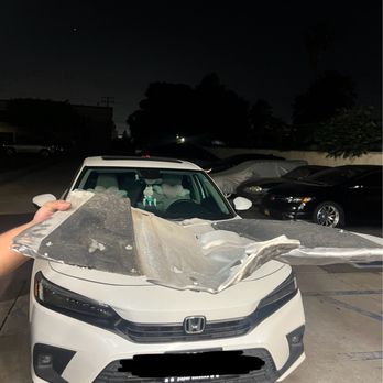 Jiffy Lube Oil Change - improper installation of damaged engine splash guard leading to damages - Auto Repair Near Me - Rosemead, California