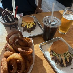 Onion Rings, Manny's beer, Spicy Smash and Classic Hammer Burger
