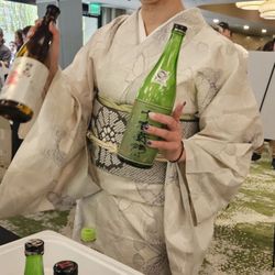 Japanese American Cultural & Community Center - Stupendous Tippsy Sakè (sah keh) Faire at JACCC. Elegant lady in luxurious, traditional Kimono.