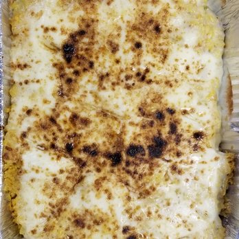 Versailles - Looks like lasagna...it is arroz imperial - Cuban Near Me - Miami, Florida Versailles - Looks like lasagna...it is arroz imperial - Cuban Near Me - Miami, Florida