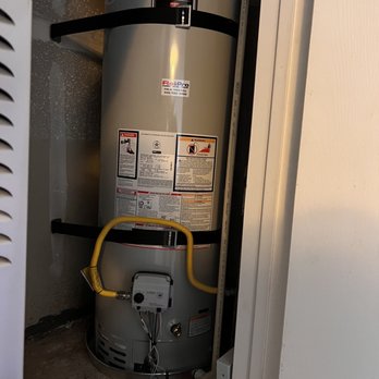 Flo Pro - After, new heater with new valves, overflow tank, drip pan and straps. - Plumbing Near Me