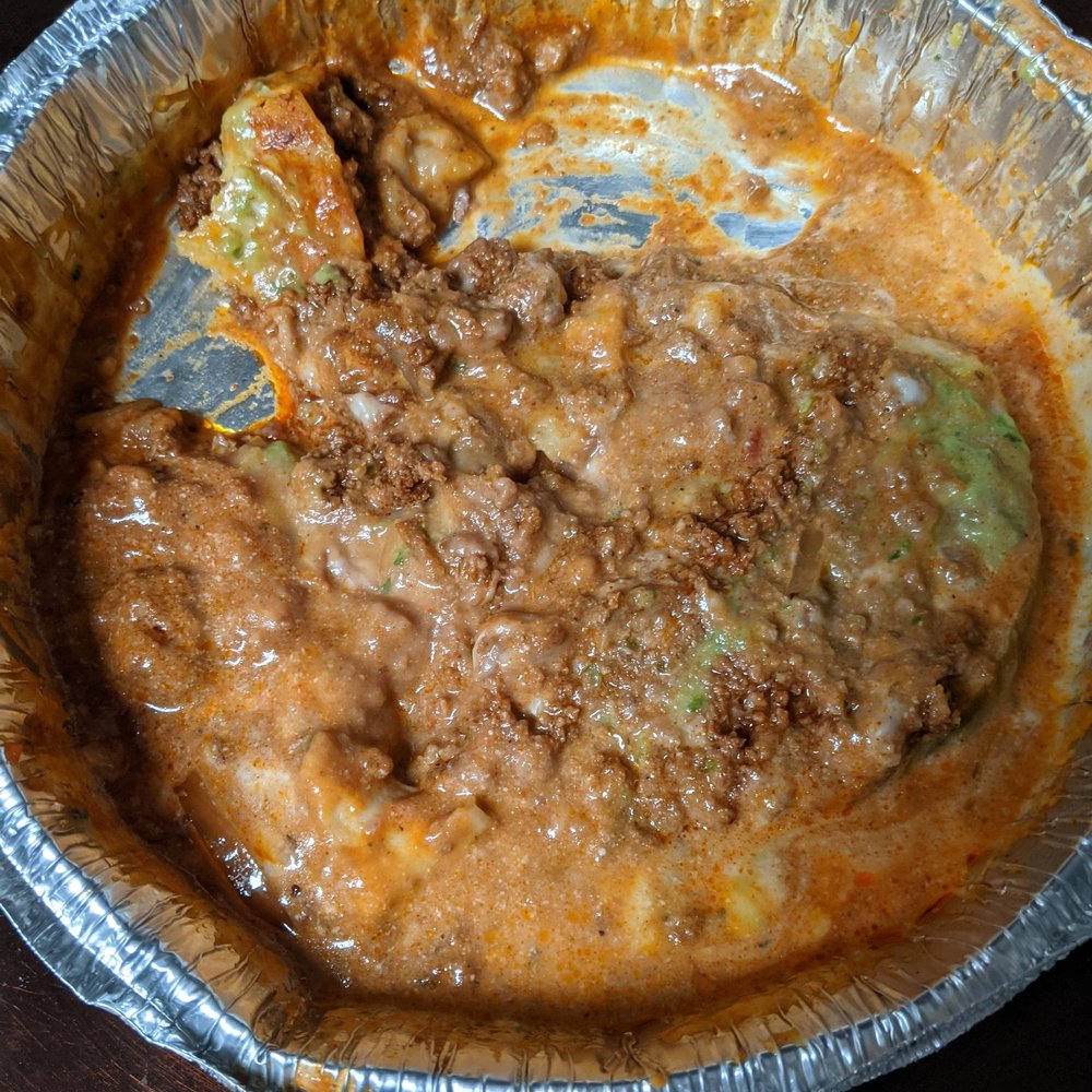 Beef enchilada (which I ate)over to far right was a flat Chili Relleno. Beef enchilada (which I ate)over to far right was a flat Chili Relleno.