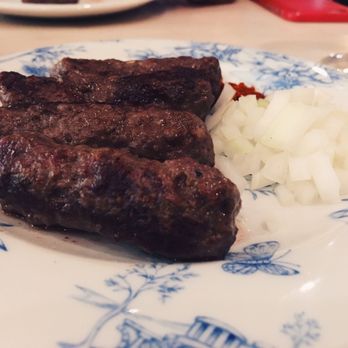 AMBAR Restaurant, Clarendon - The famous ćevapi (Balkan kabob) served with dry chili powder and fresh onions. - Modern European Near Me - Arlington, Virginia AMBAR Restaurant, Clarendon - The famous ćevapi (Balkan kabob) served with dry chili powder and fresh onions. - Modern European Near Me - Arlington, Virginia