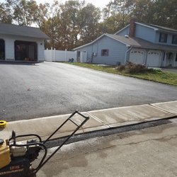 Bonk's Trucking and Grading - New asphalt driveway with new concrete apron