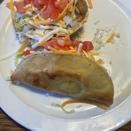 Bean & Cheese Tostada and traditional ground beef Taco Bean & Cheese Tostada and traditional ground beef Taco