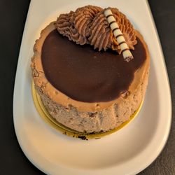 Main Street Cafe - Light and fluffy chocolate cheesecake with a chocolate crumb base.