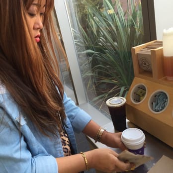 The Coffee Bean & Tea Leaf - a woman at a counter - Coffee & Tea Near Me - Long Beach, California The Coffee Bean & Tea Leaf - a woman at a counter - Coffee & Tea Near Me - Long Beach, California