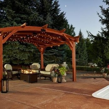 Outdoor Innovations - a patio with a hot tub - General Contractors Near Me - Port Saint Lucie, Florida Outdoor Innovations - a patio with a hot tub - General Contractors Near Me - Port Saint Lucie, Florida