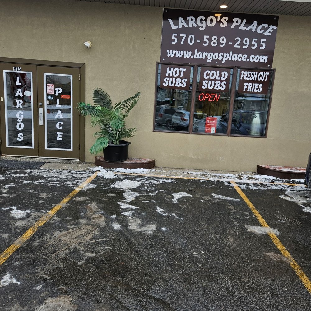 Largo’s Place - a parking lot with snow on the ground - Sandwiches Near Me - Old Forge, Pennsylvania