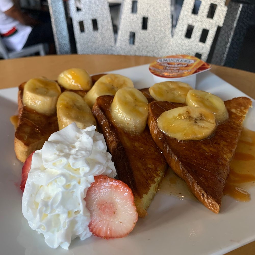 Nostrand Station Bar & Lounge - Banana Foster French Toast - Bars Near Me - Brooklyn, New York Nostrand Station Bar & Lounge - Banana Foster French Toast - Bars Near Me - Brooklyn, New York