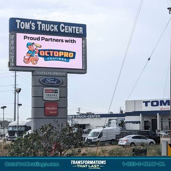 Octo Pro Coatings - a sign for a truck center - Flooring Near Me - Irvine, California Octo Pro Coatings - a sign for a truck center - Flooring Near Me - Irvine, California