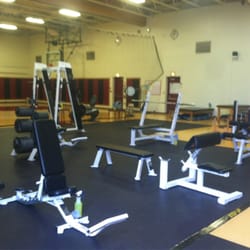 Turner Community Center - Free weight section, basketball court in the background.