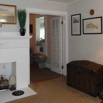 Maplewood Inn & Motel - The lounge with several well chosen accents, and the Inn's history on the wall. - Hotels Near Me - Casco, Maine Maplewood Inn & Motel - The lounge with several well chosen accents, and the Inn's history on the wall. - Hotels Near Me - Casco, Maine