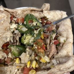 Very unappealing carnitas burrito. Also was ice cold Very unappealing carnitas burrito. Also was ice cold