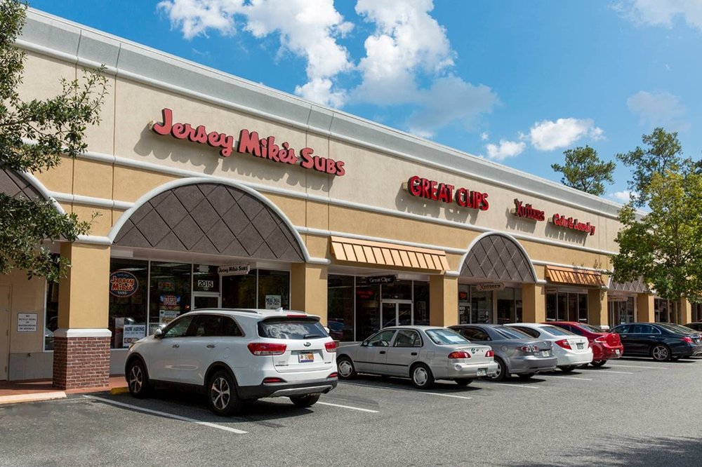 MILLHOPPER SHOPPING CENTER Updated August 2024 41114121 NW 16th Blvd, Gainesville, Florida