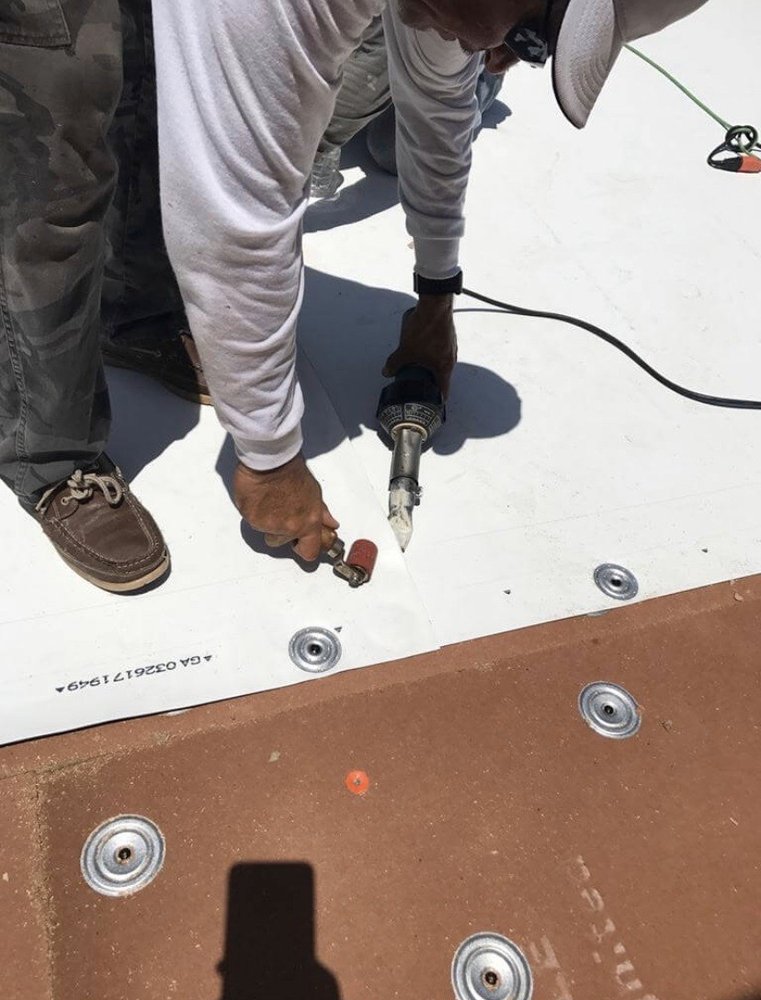 Slide of Trujillo’s Roofing