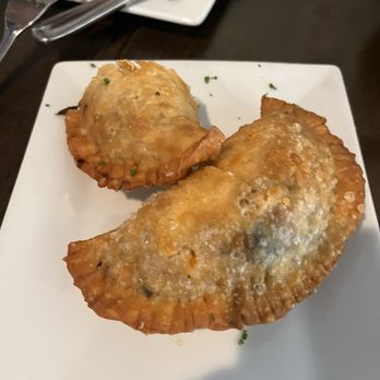 España Restaurant & Tapas - Chicken empanadas stuffed with cheese and more! Hearty and delicious! - Spanish Near Me - Fernandina Beach, Florida España Restaurant & Tapas - Chicken empanadas stuffed with cheese and more! Hearty and delicious! - Spanish Near Me - Fernandina Beach, Florida