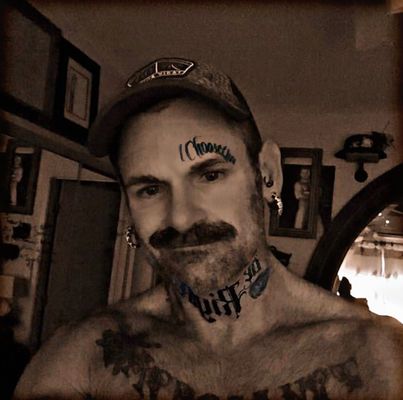 Adornment Piercing and Private Tattoo by null