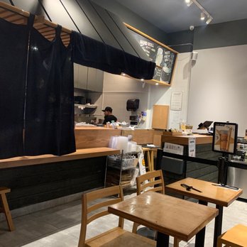 Kuu - a view of a kitchen and dining area - Ramen Near Me - New York, New York