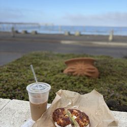 P-Town Coffee & Tea - Our view n one of the best bagels I've ever had... turkey, cream cheese, avocado on a jalapeño cheese bagel yum