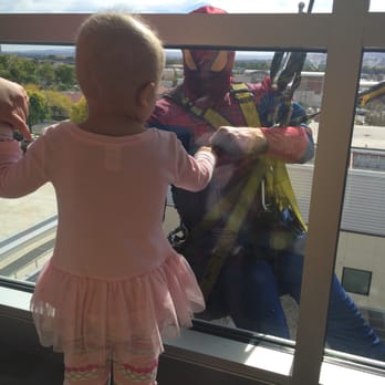 Sparkling Clean Windows - Our amazing team of employees does the "Superhero" window cleaning visit at Kadlec Pediatric wing a few times each year. - Gutter Services Near Me - Kennewick, Washington