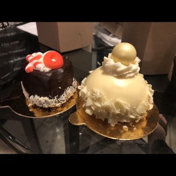 Button Rock Bakery Lafayette - Pictured is there Passion Fruit (White Chocolate) Bombe and a Petit Fluer. - Desserts Near Me - Lafayette, Colorado Button Rock Bakery Lafayette - Pictured is there Passion Fruit (White Chocolate) Bombe and a Petit Fluer. - Desserts Near Me - Lafayette, Colorado