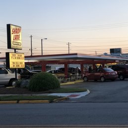 a parking lot with parked cars