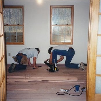 Ron Rocheleau Carpentry - two men working on a wood floor - General Contractors Near Me - Winooski, Vermont Ron Rocheleau Carpentry - two men working on a wood floor - General Contractors Near Me - Winooski, Vermont