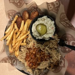 Barbecue, slaw, French fries, and Hush Puppies Barbecue, slaw, French fries, and Hush Puppies