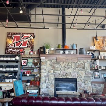 Vintage Grounds Coffeehouse - a fireplace in the middle of the room - Coffee & Tea Near Me - Muskego, Wisconsin