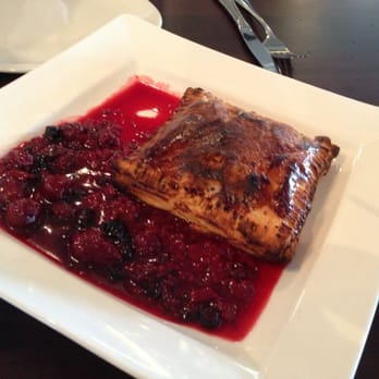 Snug Harbour - Baked Brie. Done in philo pastry with a wild berry compote - Seafood Near Me - Mississauga, Ontario Snug Harbour - Baked Brie. Done in philo pastry with a wild berry compote - Seafood Near Me - Mississauga, Ontario