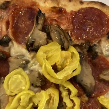 Palace Pizza - a slice of pizza with pepperoni, mushrooms, and jalapenos - Pizza Near Me - Lakeland, Florida