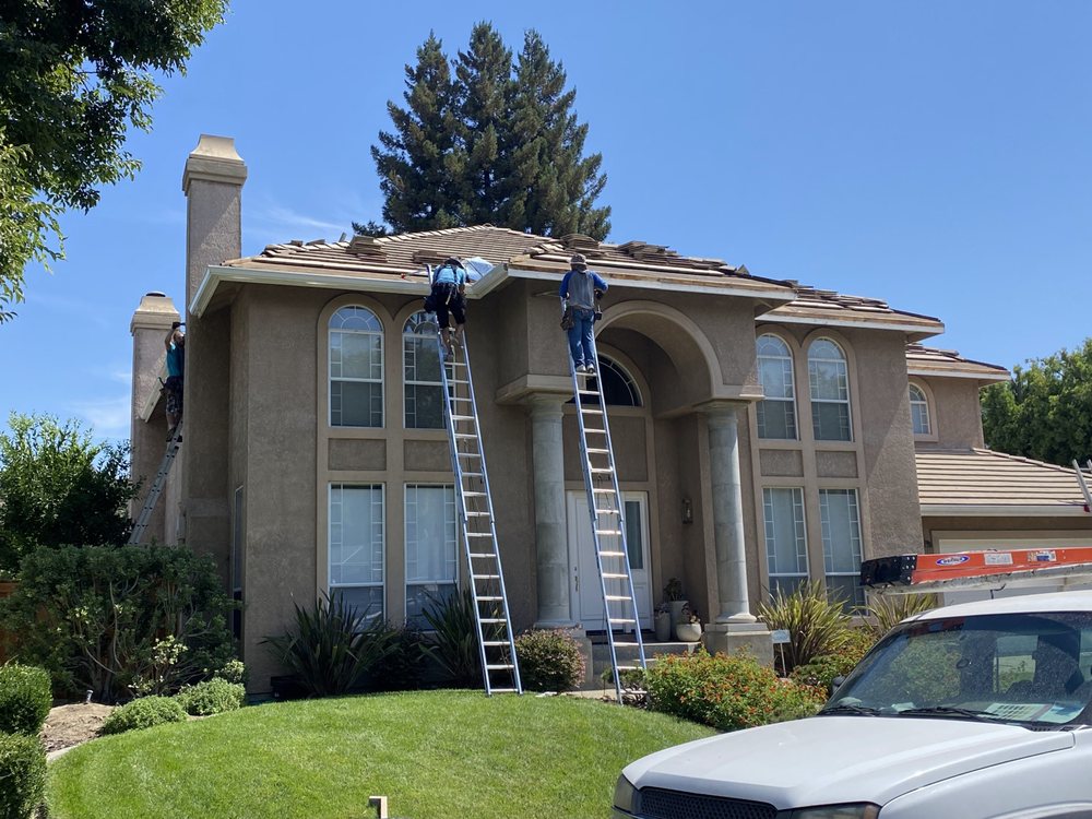 Slide of Galaxy Roofing