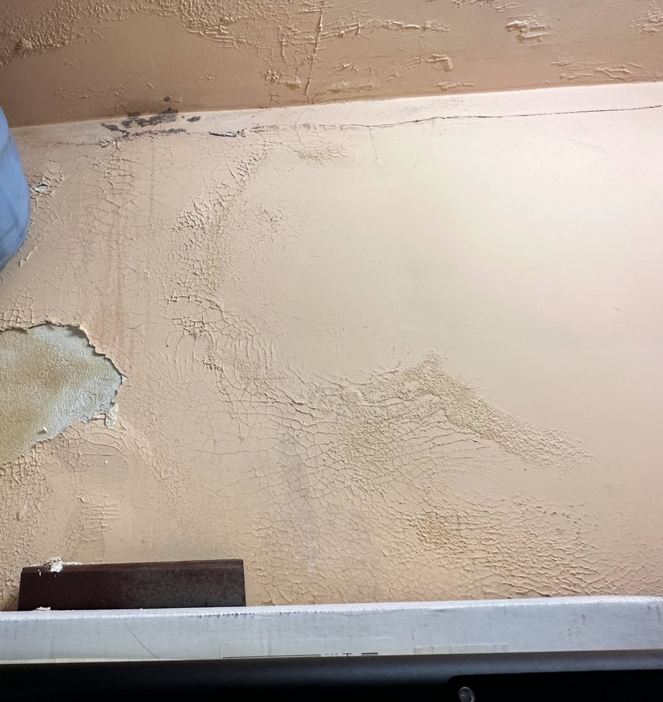 Slide of Wolfe Roofing Company