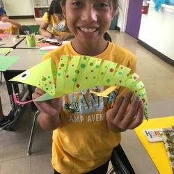 Kallpachay Spanish Immersion - The camper was proud of her lizard she created in camp.