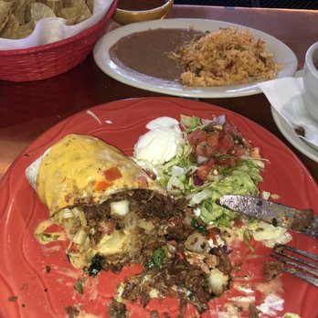 Taquilo's - Grande burrito con queso. I was supposed to take a picture before I started to eat but i was too hungry! - Mexican Near Me - Galveston, Texas Taquilo's - Grande burrito con queso. I was supposed to take a picture before I started to eat but i was too hungry! - Mexican Near Me - Galveston, Texas
