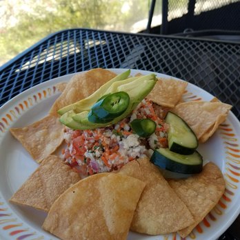 Nury’s - Fresh, tasty ceviche topped with avocado and cucumber slices. Crispy housemade chips and deliciously spicy salsa alongside. - Breakfast & Brunch Near Me - Fredericksburg, Texas Nury’s - Fresh, tasty ceviche topped with avocado and cucumber slices. Crispy housemade chips and deliciously spicy salsa alongside. - Breakfast & Brunch Near Me - Fredericksburg, Texas